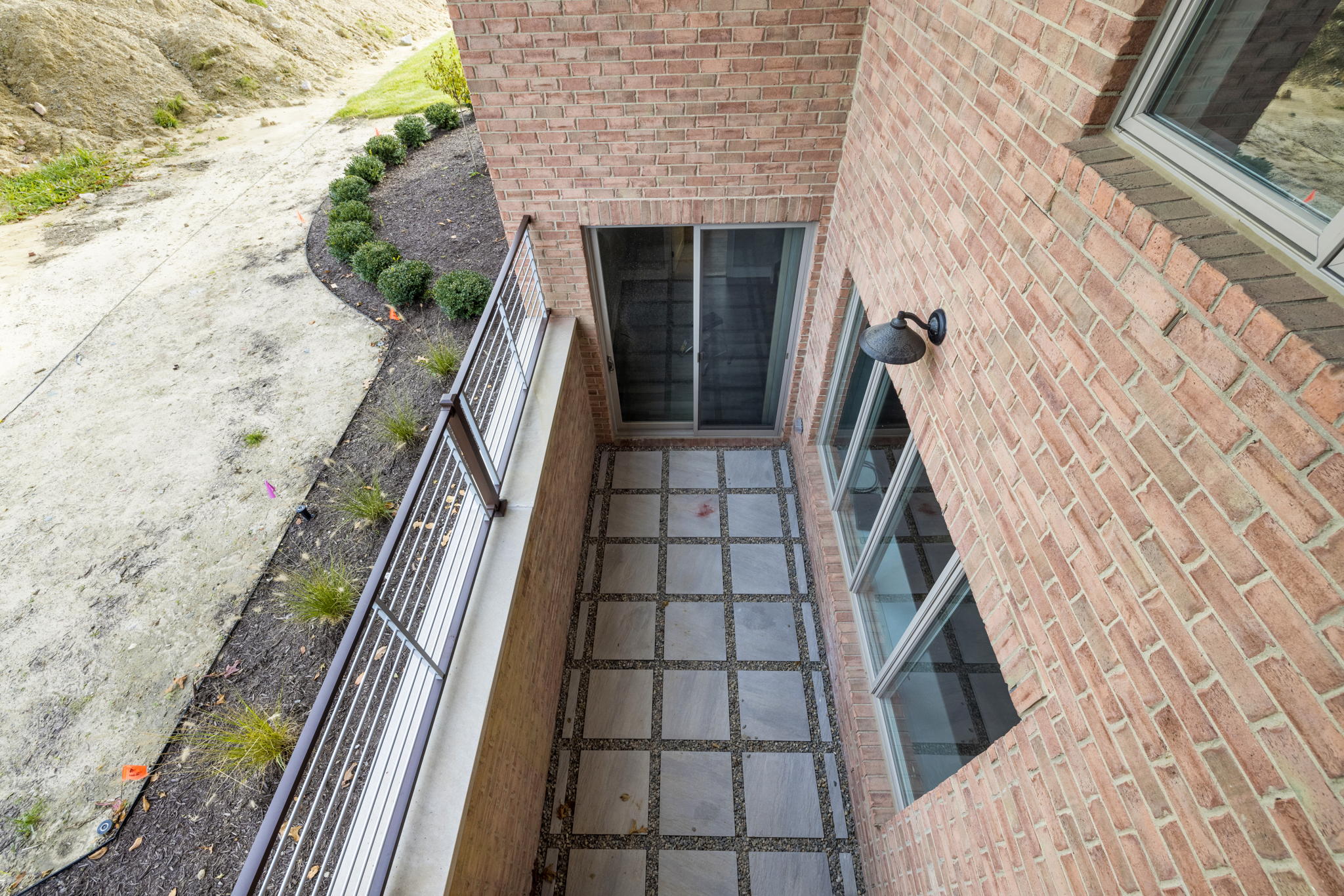 Woodline Building Company Project: Brick Ranch Exterior Lower Level Patio
