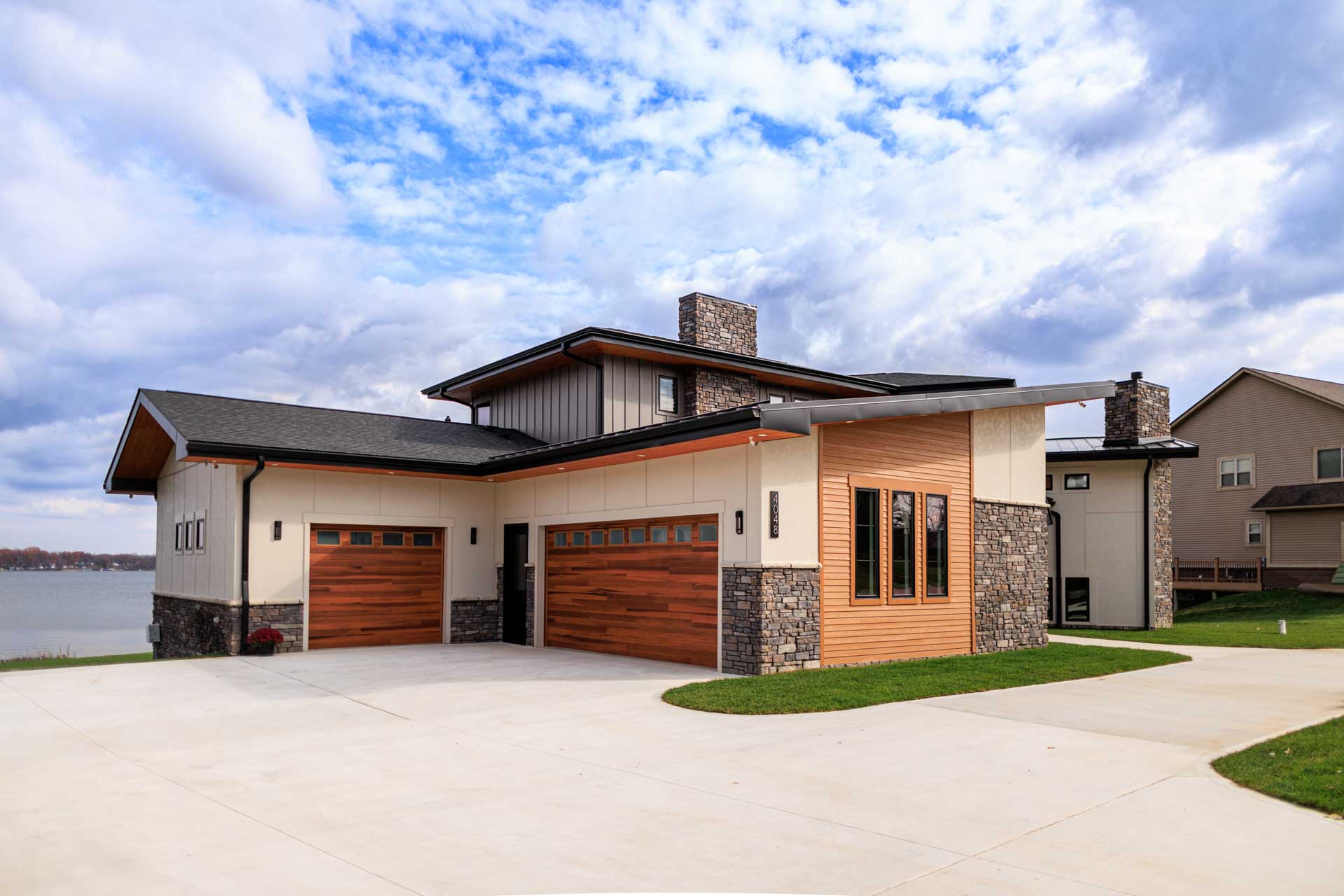 Woodline Building Company Modern Lakefront Lake Nepessing Lapeer, Michigan 3 Car Garage